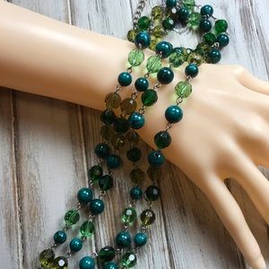 Long beaded necklace in shades of green